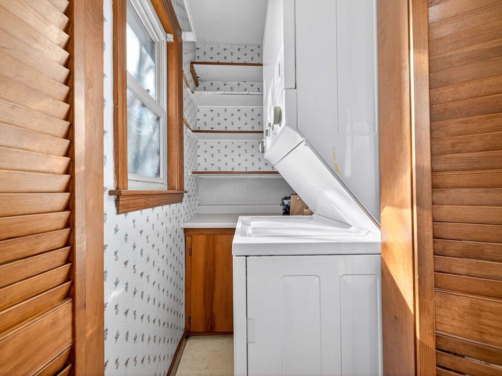 104 Greaton Road Boston, MA 02132 - Photo 31 of 42 a utility room with dryer and washer