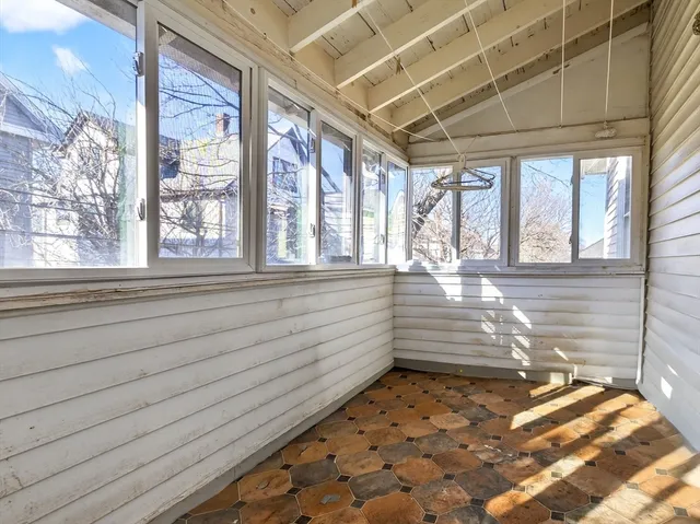 a view of a room with windows