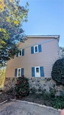 a front view of house with yard