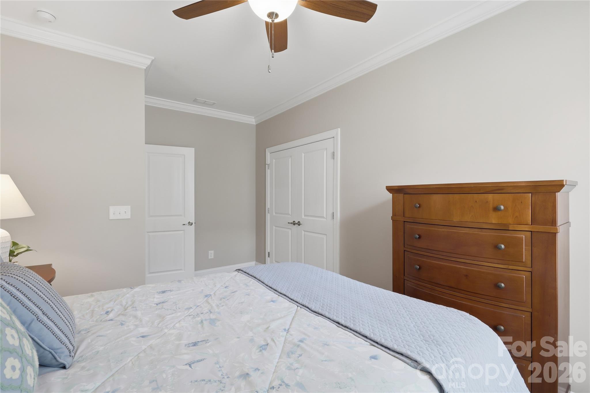 3023 Eagle Ridge Lane Indian Trail, NC 28079 - Photo 46 of 47 a bedroom with a bed and a dresser