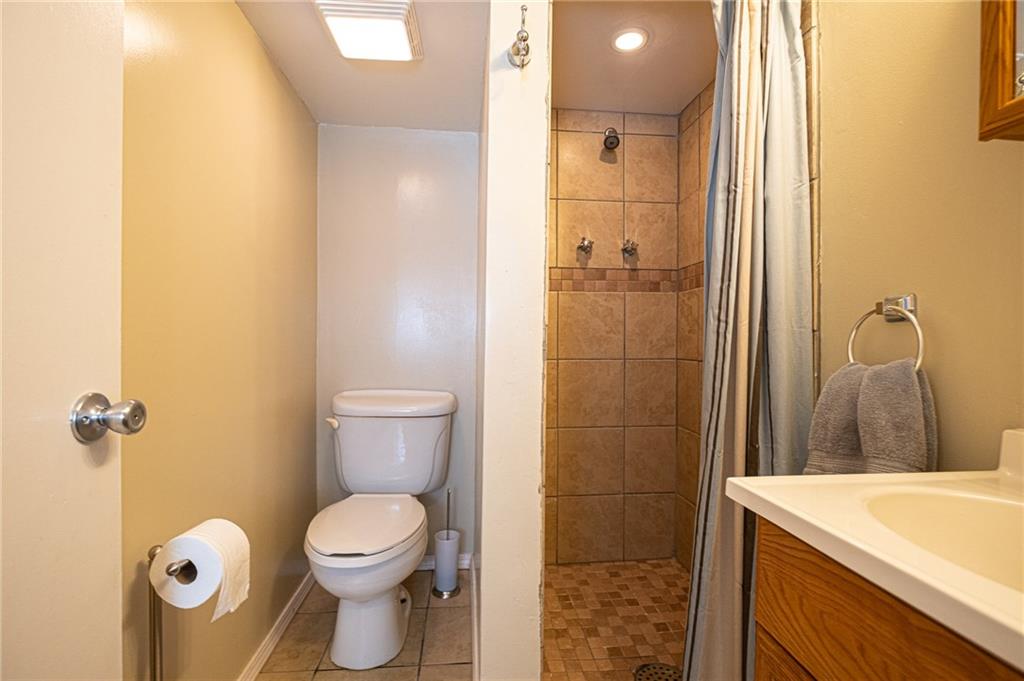 40 Highbury Road Cheswick, PA 15024 - Photo 16 of 25 BEAUTIFULLY RENOVATED FULL BATH IN THE LOWER LEVEL ... GREAT FOR VISITING GUESTS WHO CAN ALSO UTILIZE THE GAMEROOM AREA FOR OVERNIGHT ACCOMODATIONS.