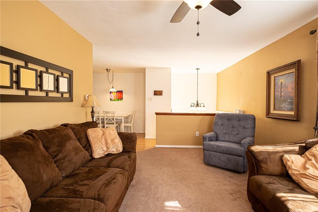 40 Highbury Road Cheswick, PA 15024 - Photo 4 of 25 LIVINGROOM IN NEUTRAL TONES AND OFFERING AN OPEN DESIGN.