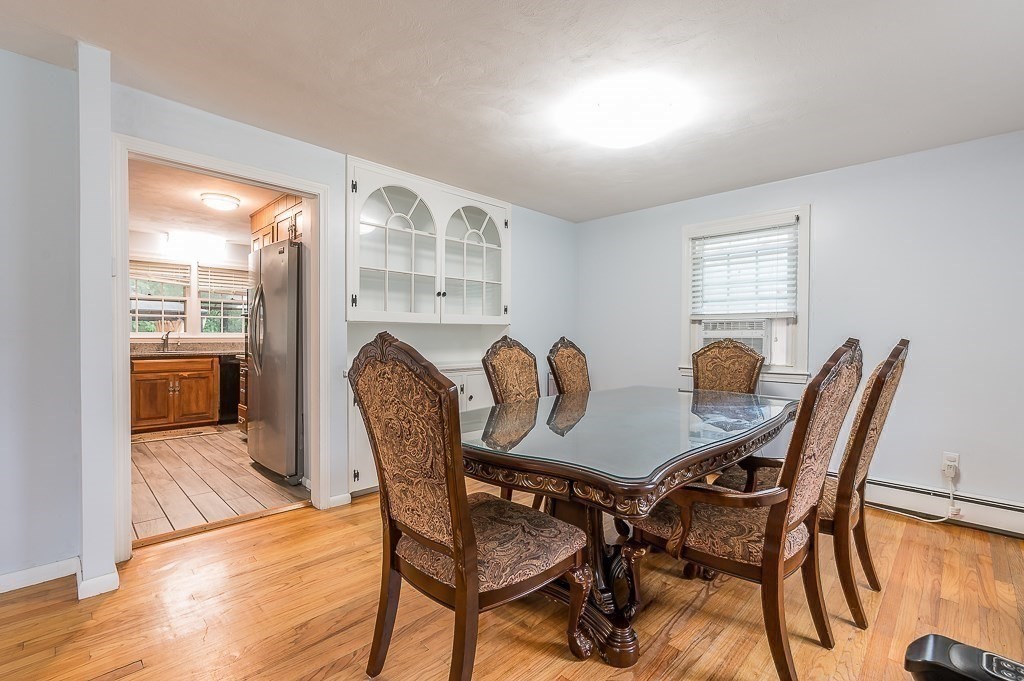 80 Pepper Road Fitchburg, MA 01420 - Photo 14 of 41 a view of a dining room with furniture and wooden floor