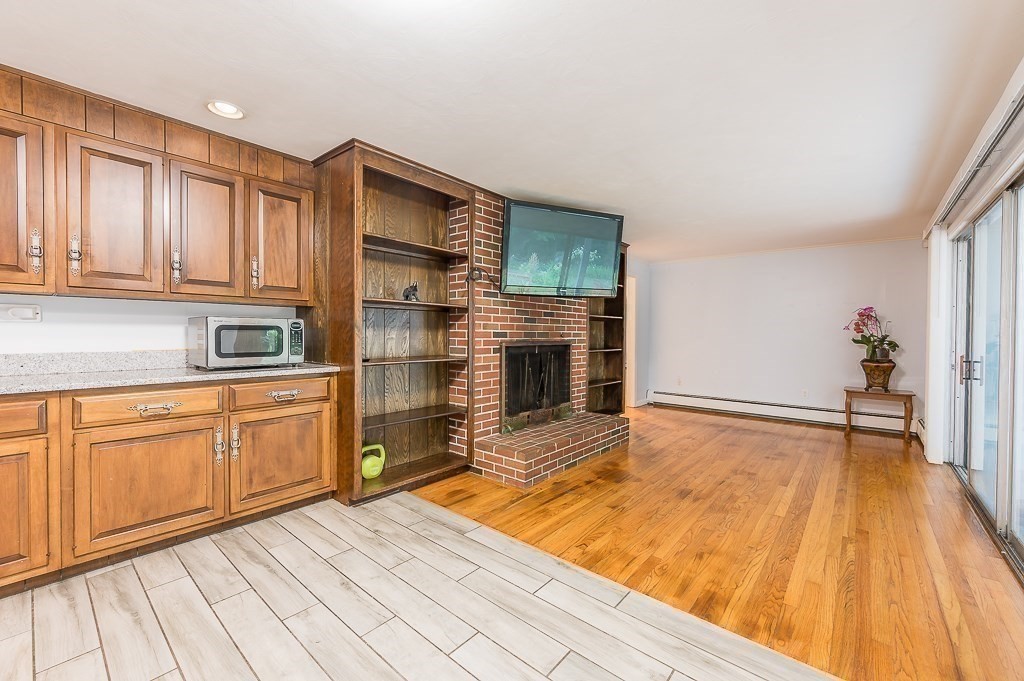80 Pepper Road Fitchburg, MA 01420 - Photo 17 of 41 a kitchen with stainless steel appliances granite countertop a refrigerator and cabinets