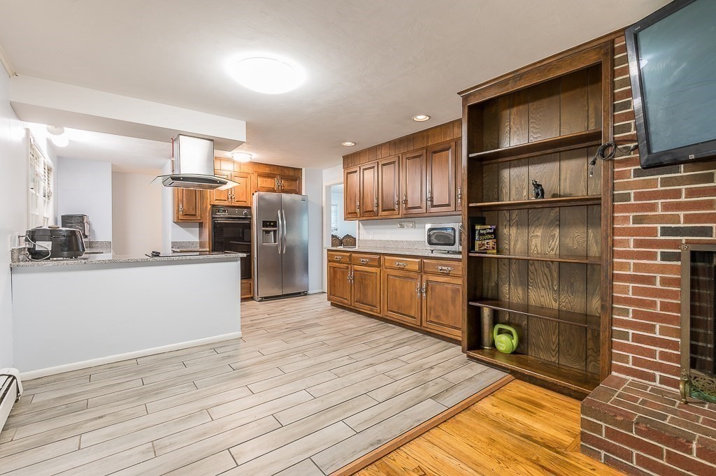 80 Pepper Road Fitchburg, MA 01420 - Photo 19 of 41 a kitchen with stainless steel appliances a refrigerator and a stove top oven