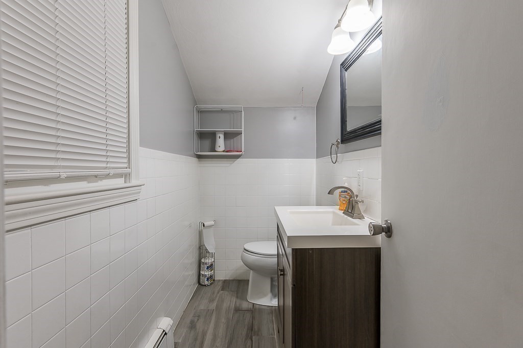 80 Pepper Road Fitchburg, MA 01420 - Photo 20 of 41 a bathroom with a sink toilet and a mirror