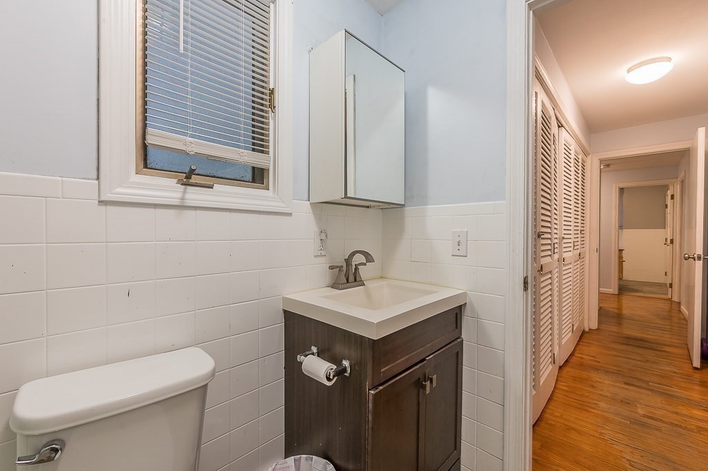 80 Pepper Road Fitchburg, MA 01420 - Photo 28 of 41 a bathroom with a sink toilet vanity and a mirror