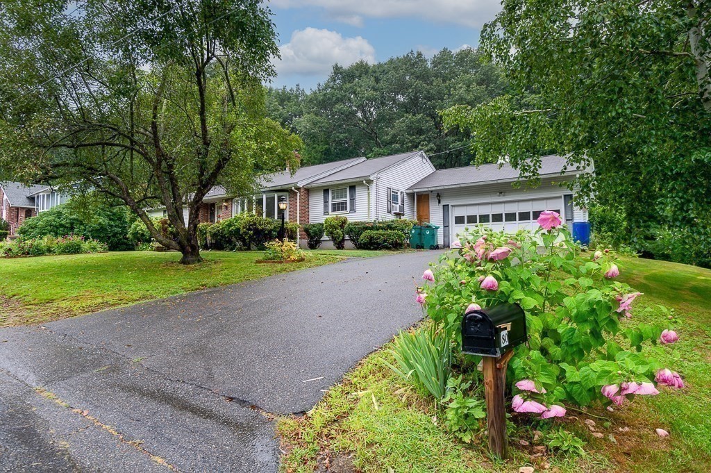 80 Pepper Road Fitchburg, MA 01420 - Photo 32 of 41 a front view of a house with a yard and potted plants