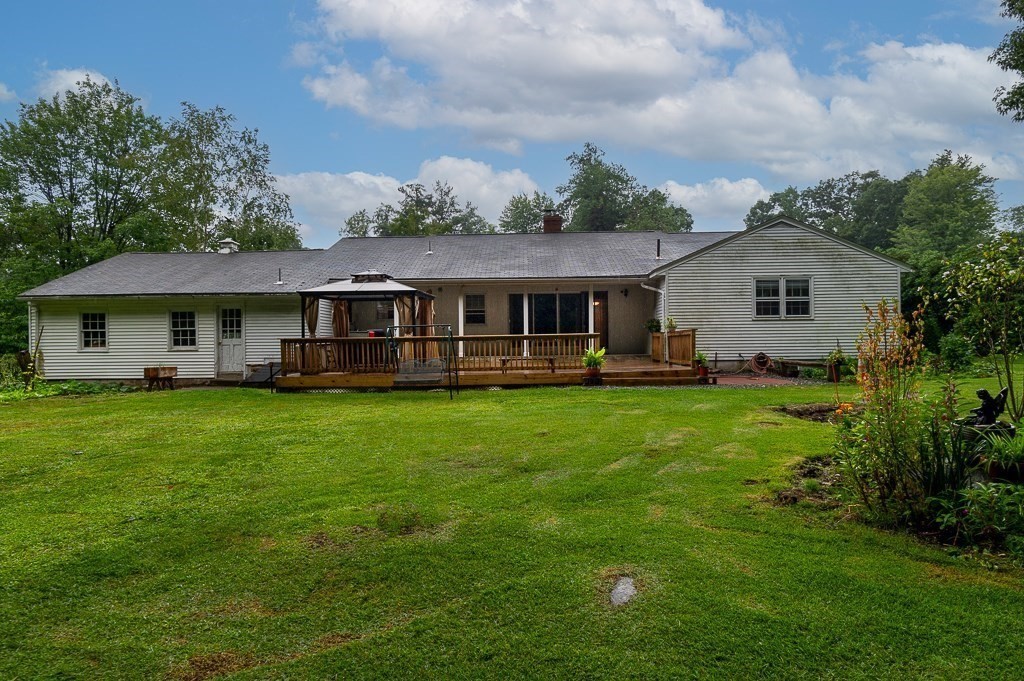 80 Pepper Road Fitchburg, MA 01420 - Photo 35 of 41 a front view of a house with a yard table and chairs