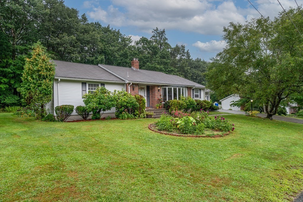 80 Pepper Road Fitchburg, MA 01420 - Photo 4 of 41 a house with garden in front of it