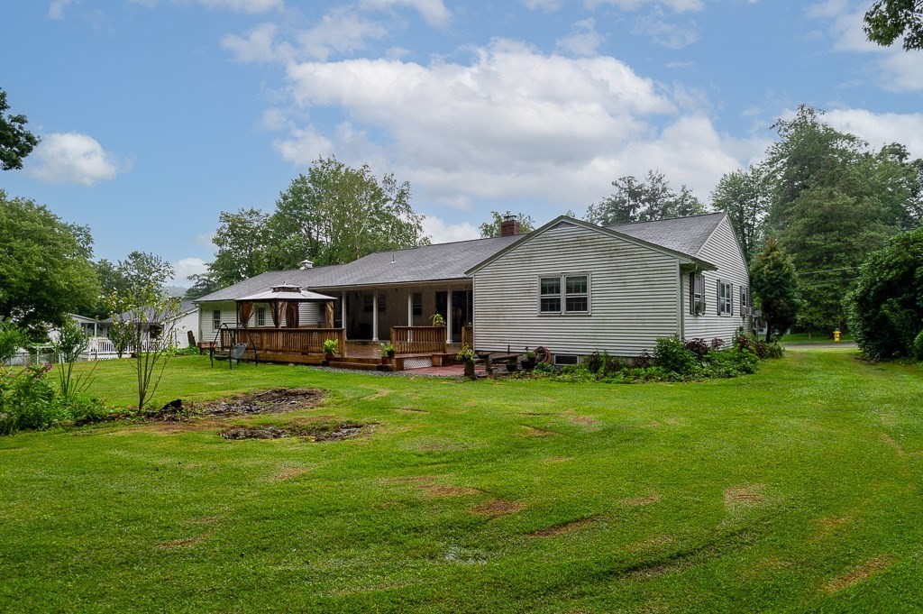 80 Pepper Road Fitchburg, MA 01420 - Photo 6 of 41 a front view of a house with a garden