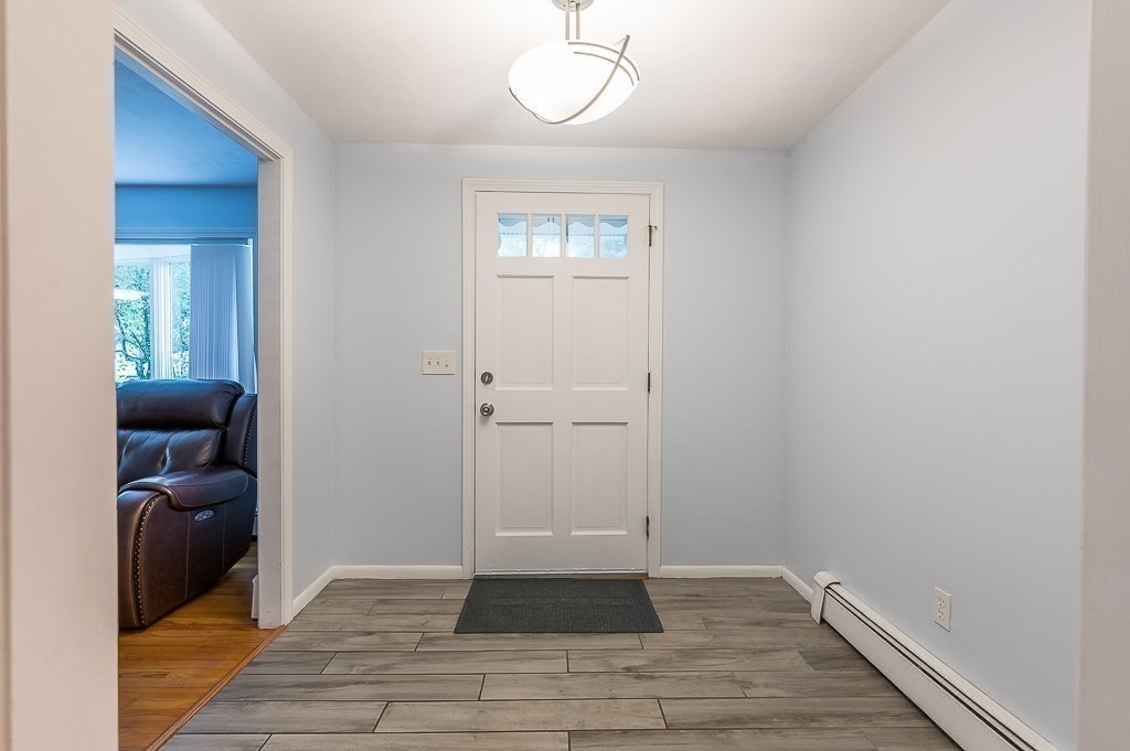 80 Pepper Road Fitchburg, MA 01420 - Photo 10 of 41 a view of a livingroom with furniture and windows