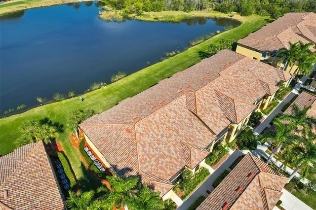a view of a hallway with wooden shelves