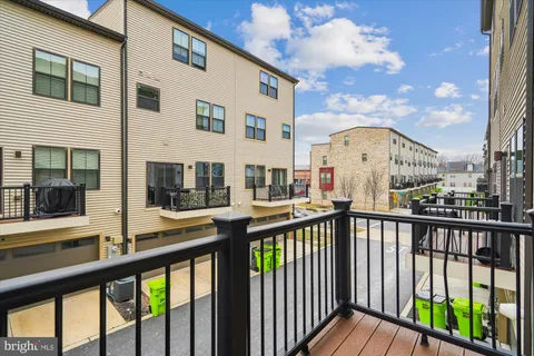 a view of a brick building from a balcony