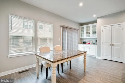 a workspace with furniture and wooden floor