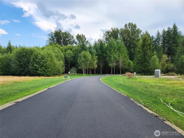 a view of a golf course with a park