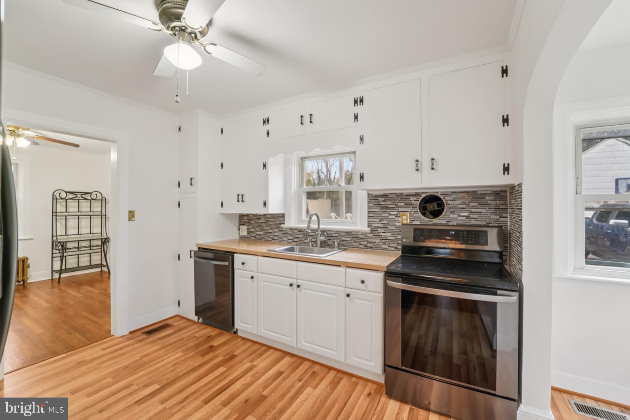 618 Military Road Frederick, MD 21702 - Photo 12 of 37 Modern kitchen with sleek finishes.