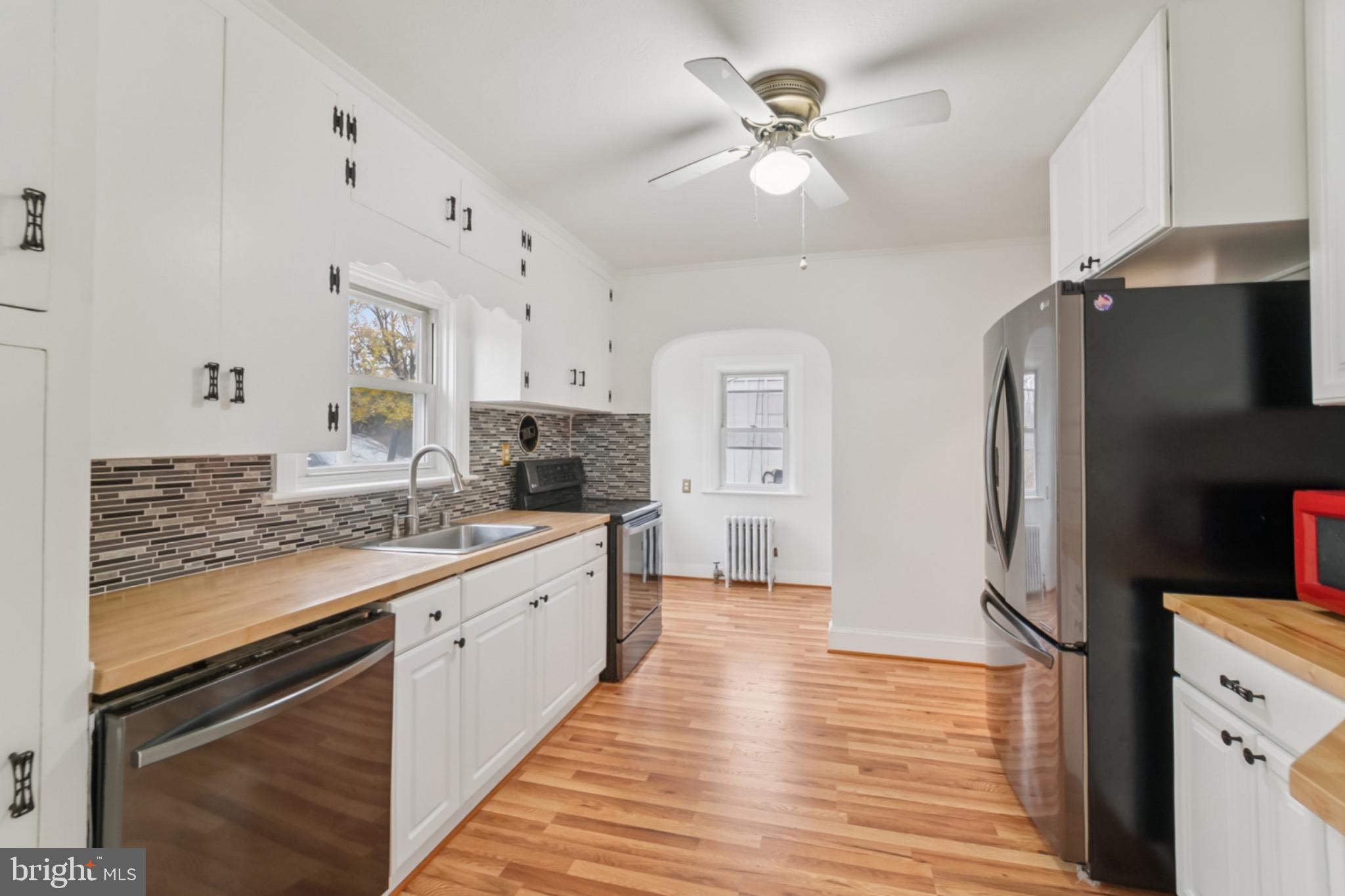 618 Military Road Frederick, MD 21702 - Photo 14 of 37 Bright and modern kitchen with sleek finishes.