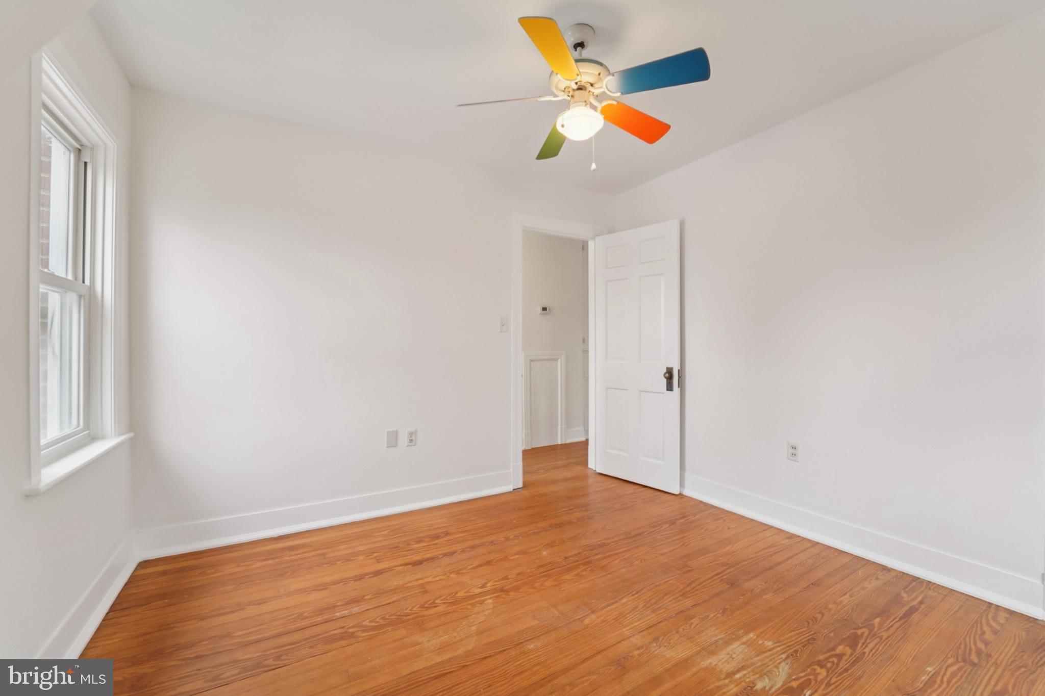618 Military Road Frederick, MD 21702 - Photo 20 of 37 Bright and airy room with colorful ceiling fan.