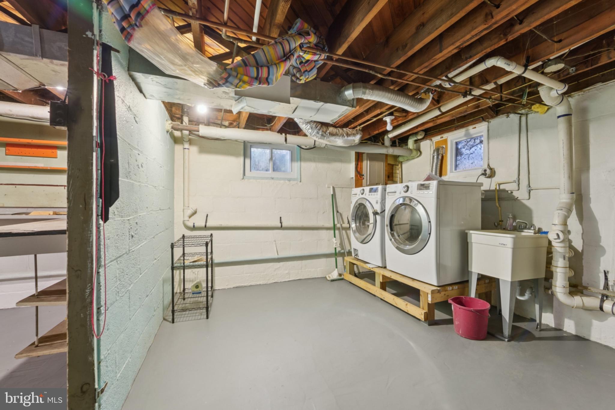 618 Military Road Frederick, MD 21702 - Photo 27 of 37 Bright and functional laundry space awaits.