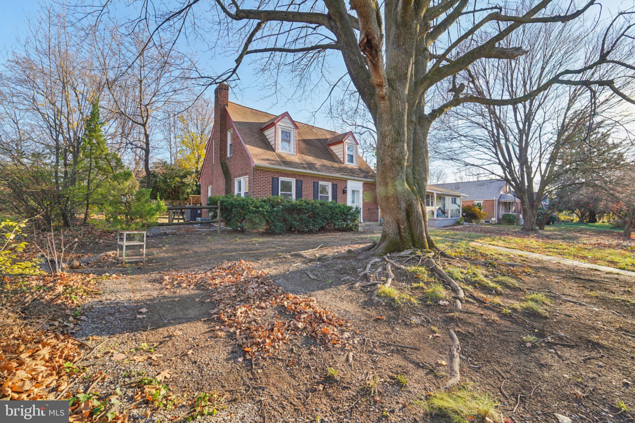 618 Military Road Frederick, MD 21702 - Photo 3 of 37 Charming home nestled under a grand tree.