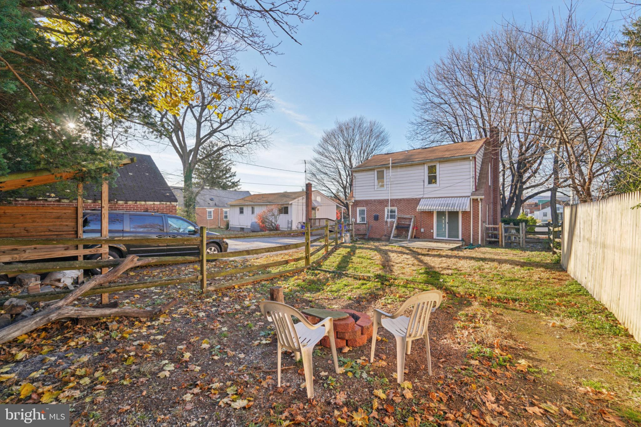 618 Military Road Frederick, MD 21702 - Photo 35 of 37 Charming backyard retreat with cozy fire pit.