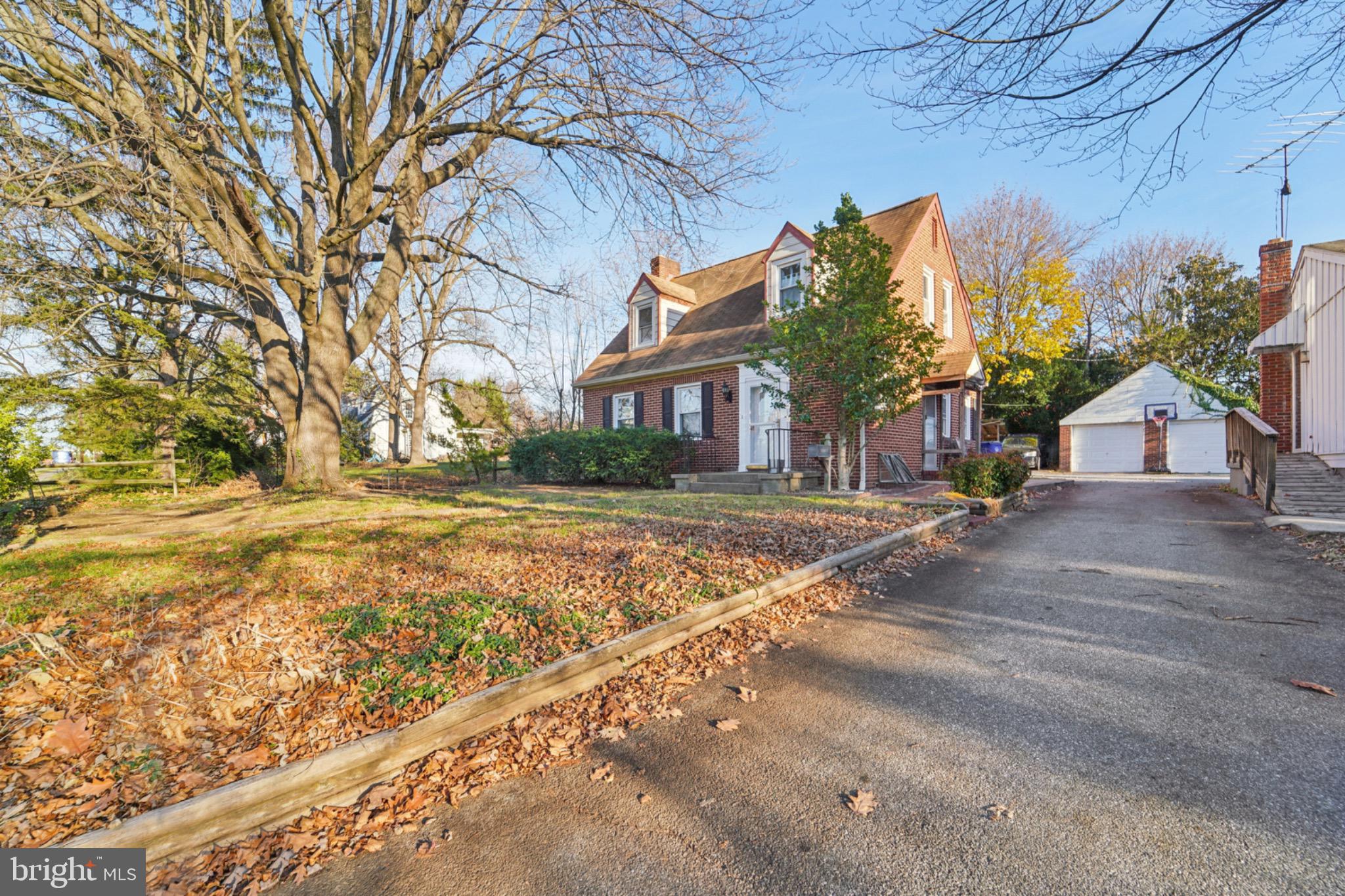 618 Military Road Frederick, MD 21702 - Photo 4 of 37 Charming brick home with lush surroundings.