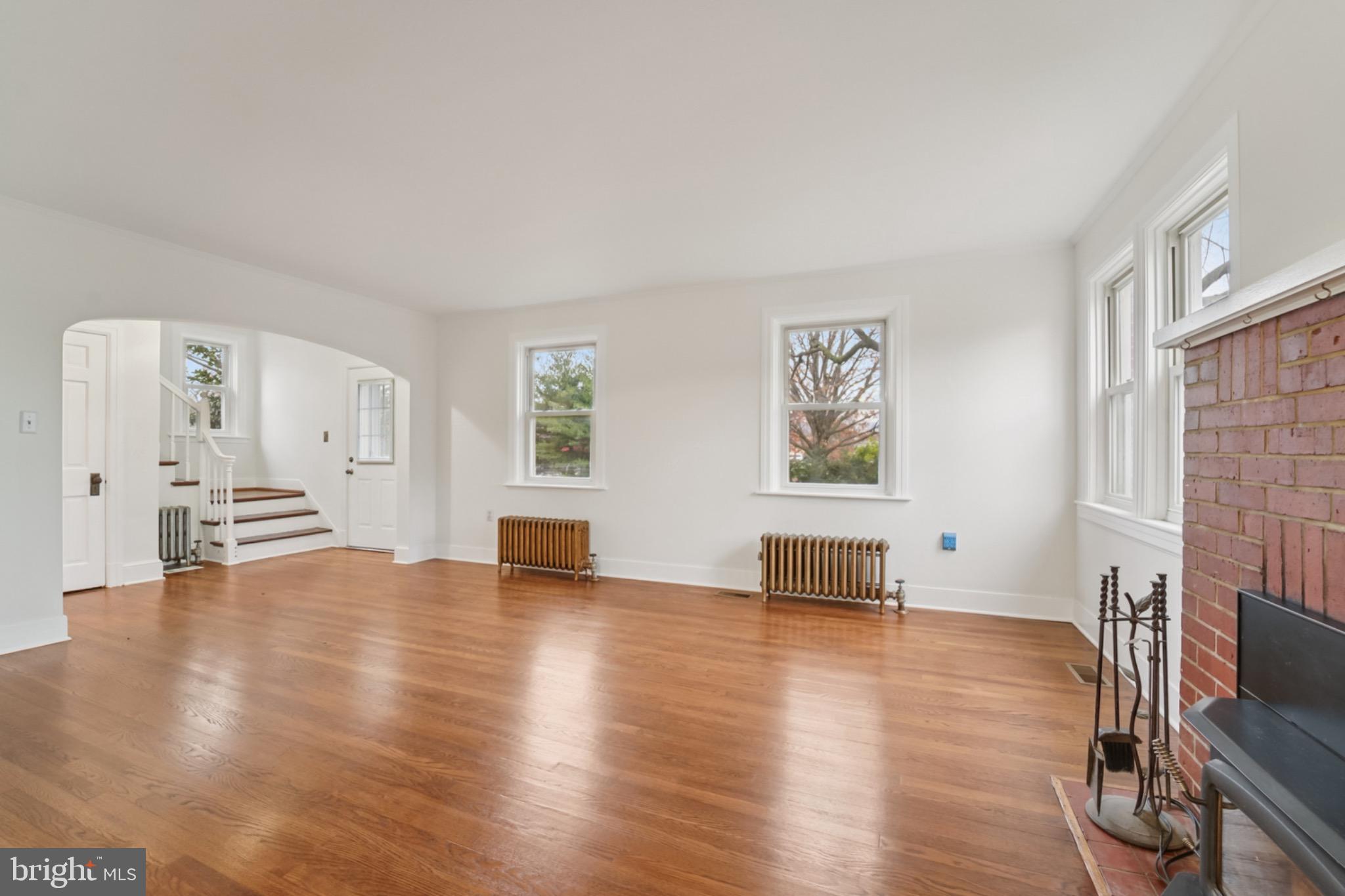 618 Military Road Frederick, MD 21702 - Photo 9 of 37 Spacious, sunlit living area with charm.