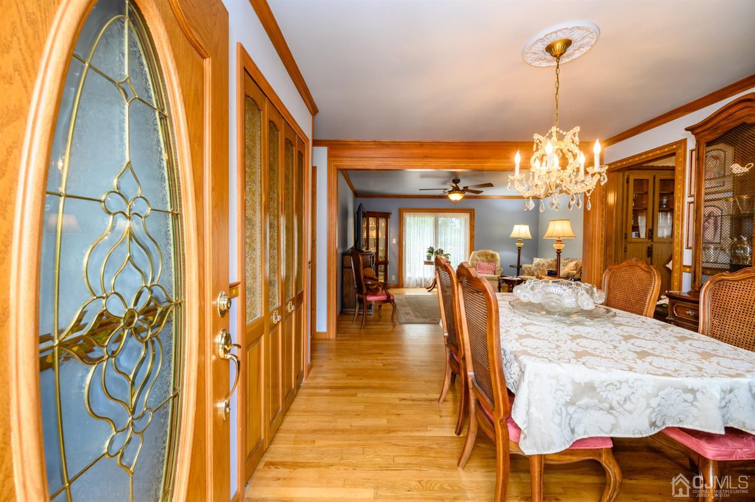 9 Brandeis Road Old Bridge, NJ 08859 - Photo 3 of 45 a dining room with wooden floor table and chairs