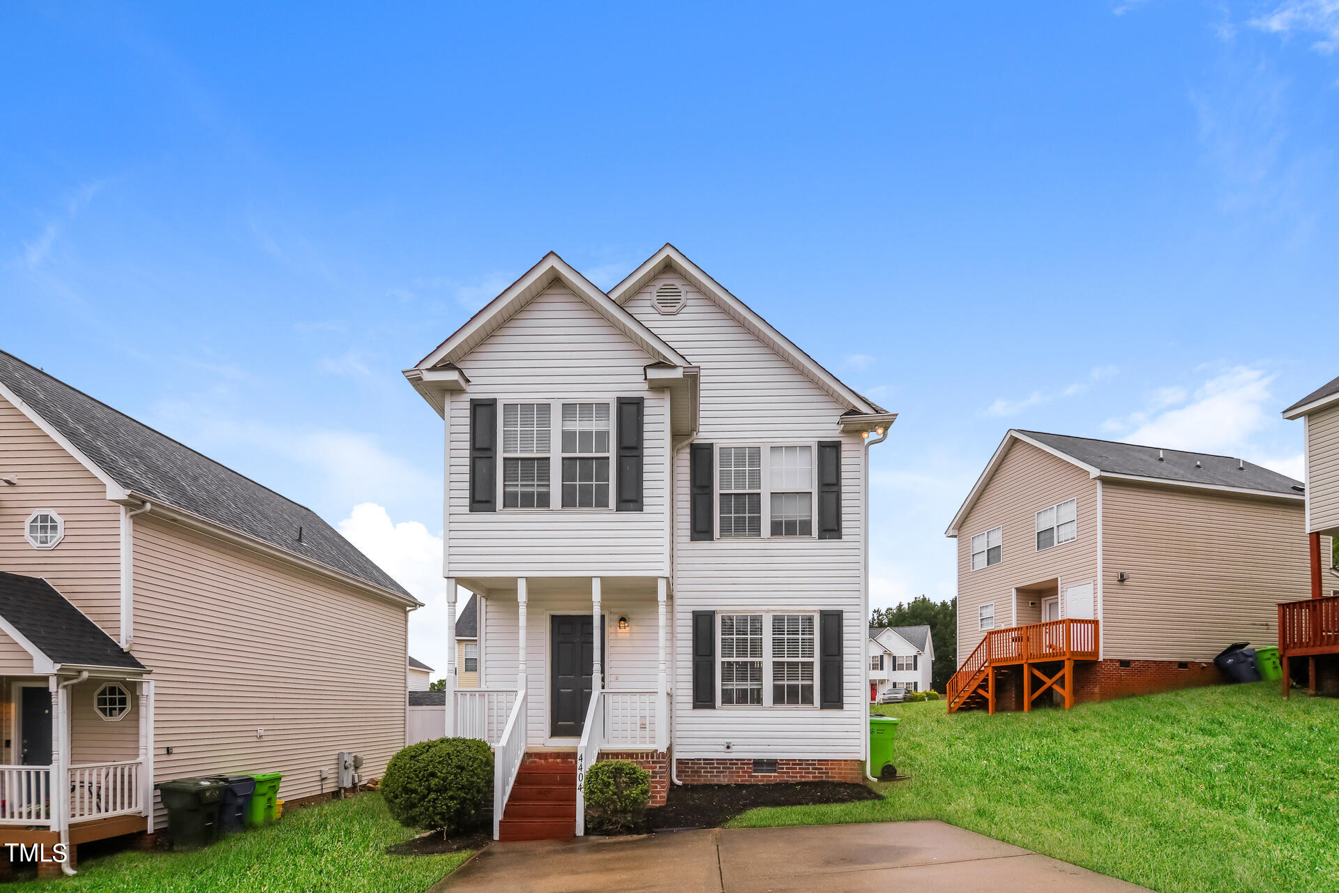 4404 Windsock Lane Raleigh, NC 27616 - Photo 1 of 15 a front view of a house with a yard