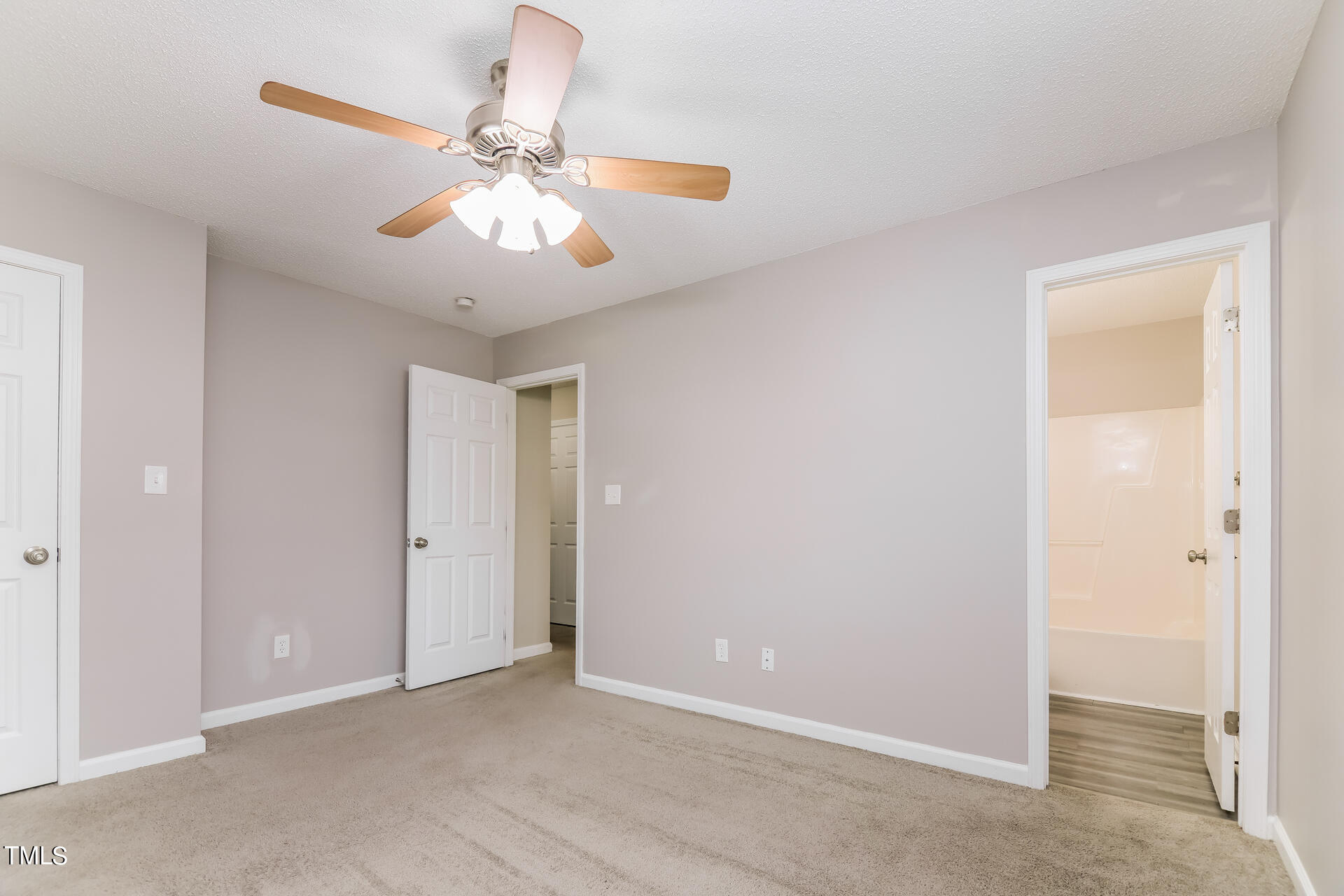 4404 Windsock Lane Raleigh, NC 27616 - Photo 14 of 15 an empty room and chandelier fan