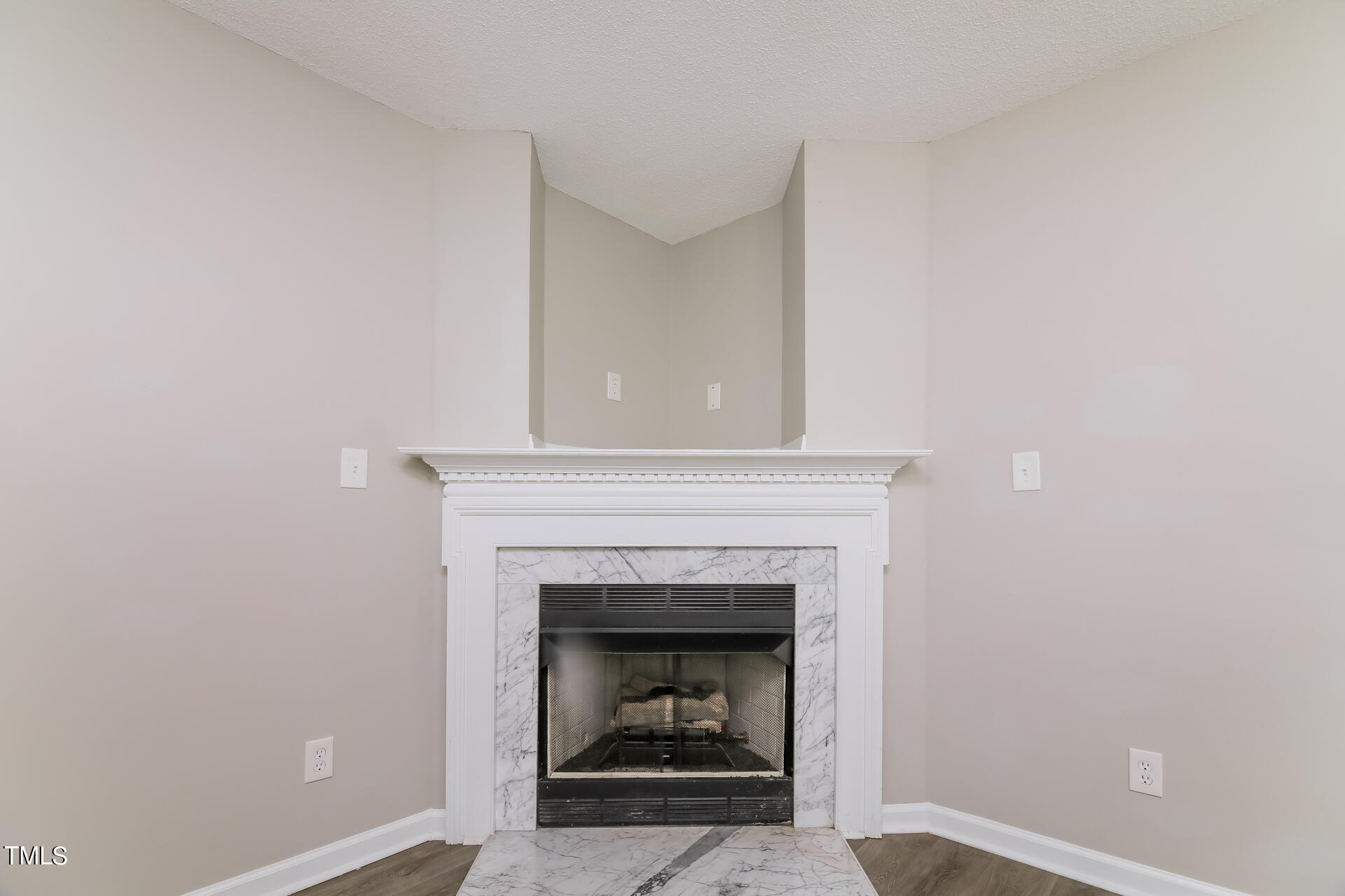 4404 Windsock Lane Raleigh, NC 27616 - Photo 4 of 15 a living room with a fireplace
