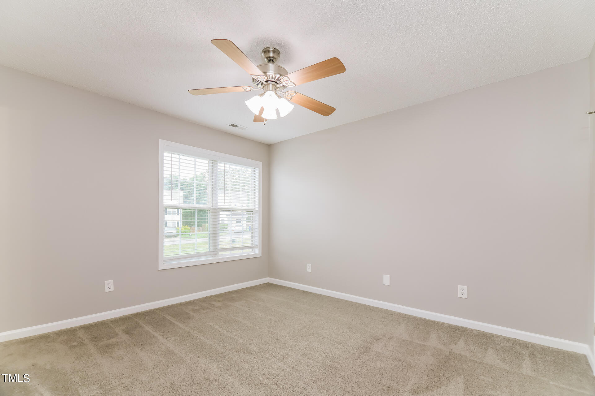 4404 Windsock Lane Raleigh, NC 27616 - Photo 8 of 15 an empty room with a window