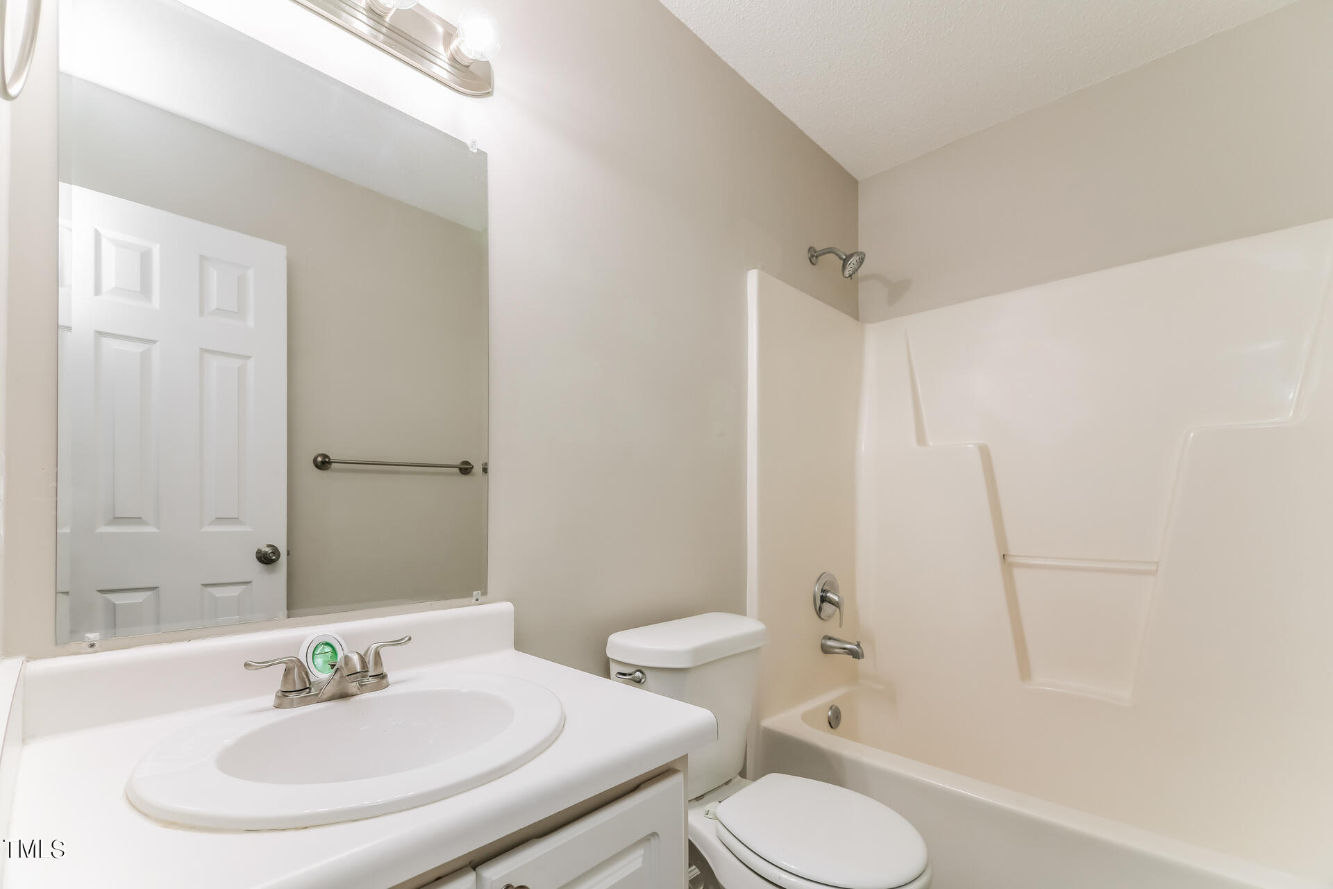 4404 Windsock Lane Raleigh, NC 27616 - Photo 9 of 15 a bathroom with a sink toilet and shower