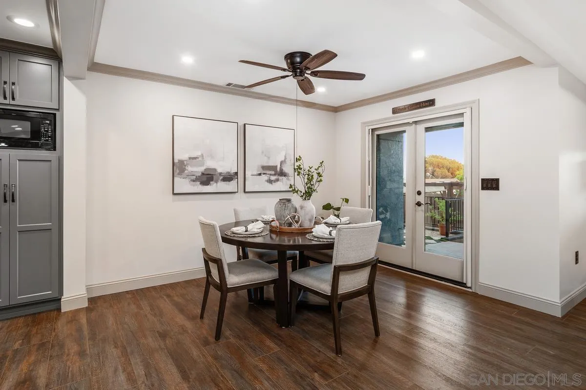 9469 Pike Road Santee, CA 92071 - Photo 12 of 39 a view of a dining room with furniture window and wooden floor