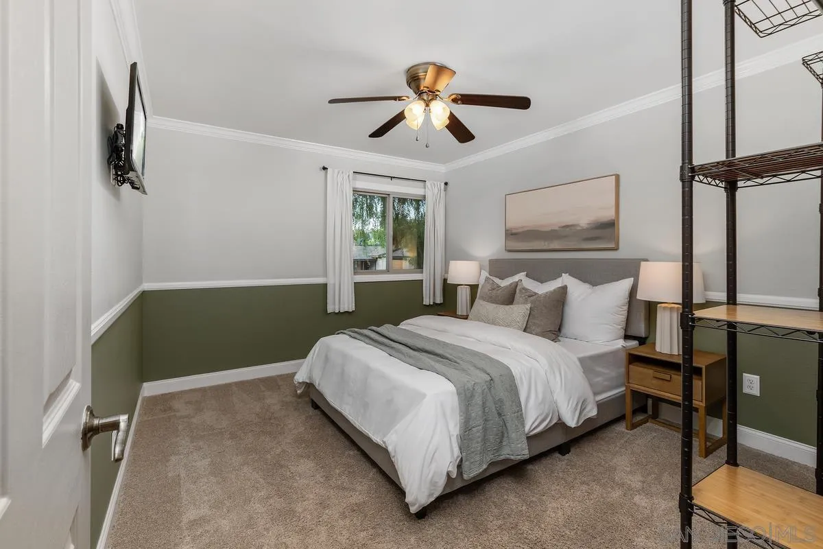 9469 Pike Road Santee, CA 92071 - Photo 18 of 39 a bedroom with a bed and window