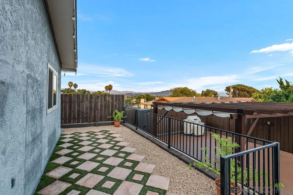 9469 Pike Road Santee, CA 92071 - Photo 29 of 39 a view of a balcony with wooden floor and fence
