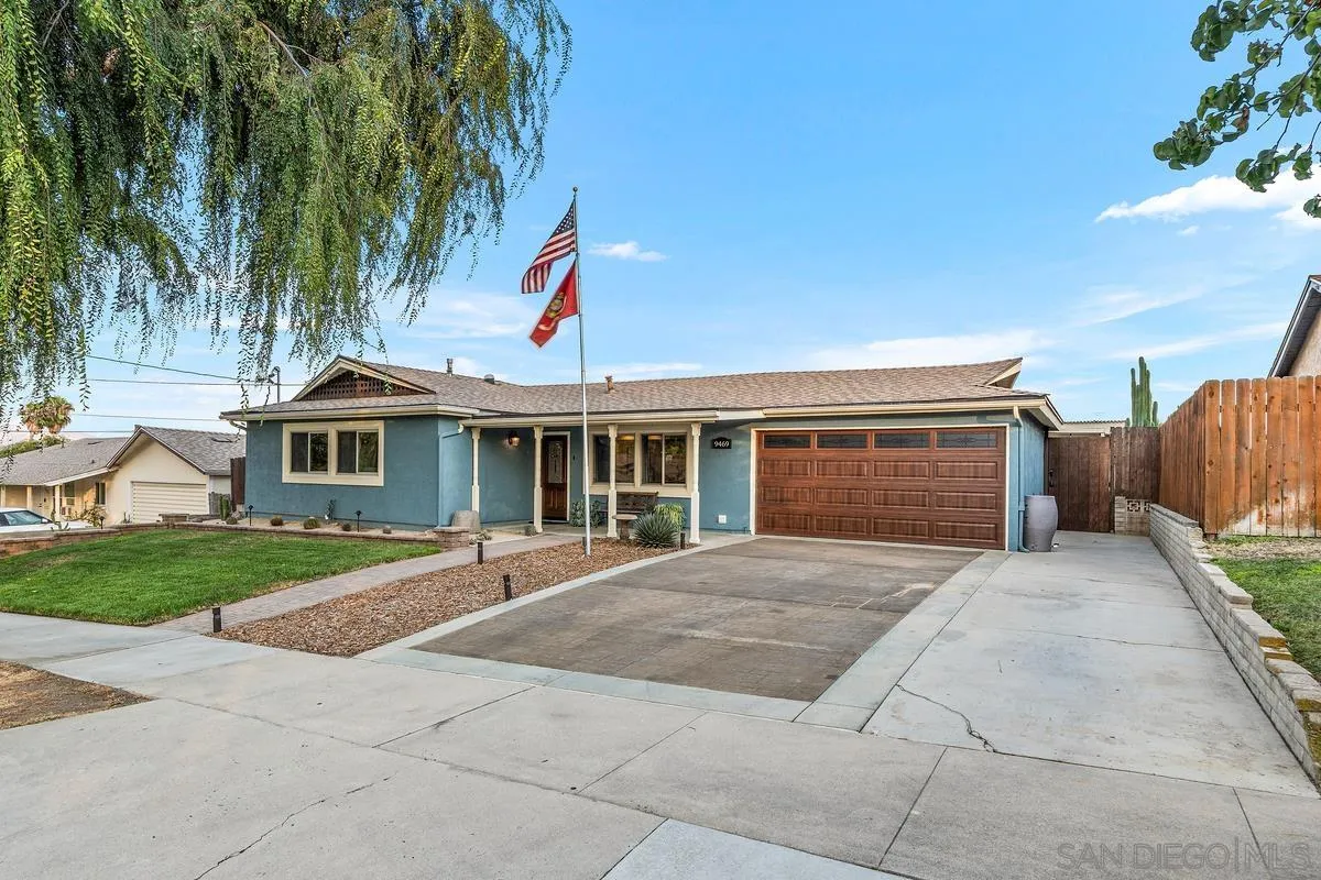 9469 Pike Road Santee, CA 92071 - Photo 3 of 39 a front view of a house with a yard and potted plants