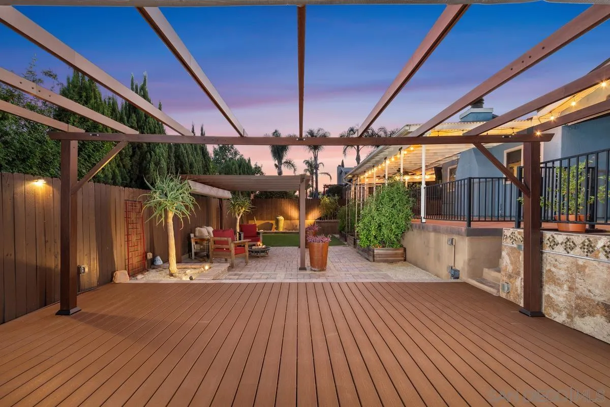 9469 Pike Road Santee, CA 92071 - Photo 34 of 39 a view of a patio with table and chairs with wooden floor