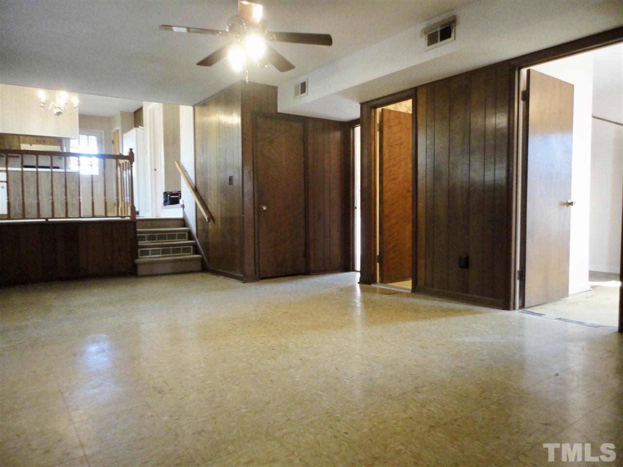 2907 New Hope Church Road Raleigh, NC 27604 - Photo 12 of 25 a view of an empty room with a cabinet