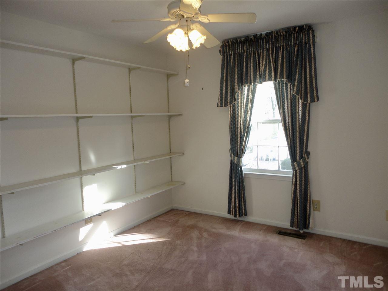 2907 New Hope Church Road Raleigh, NC 27604 - Photo 16 of 25 an empty room with windows and closet