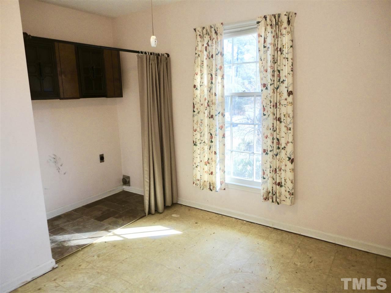 2907 New Hope Church Road Raleigh, NC 27604 - Photo 19 of 25 a view of a bathroom with a shower and a sink