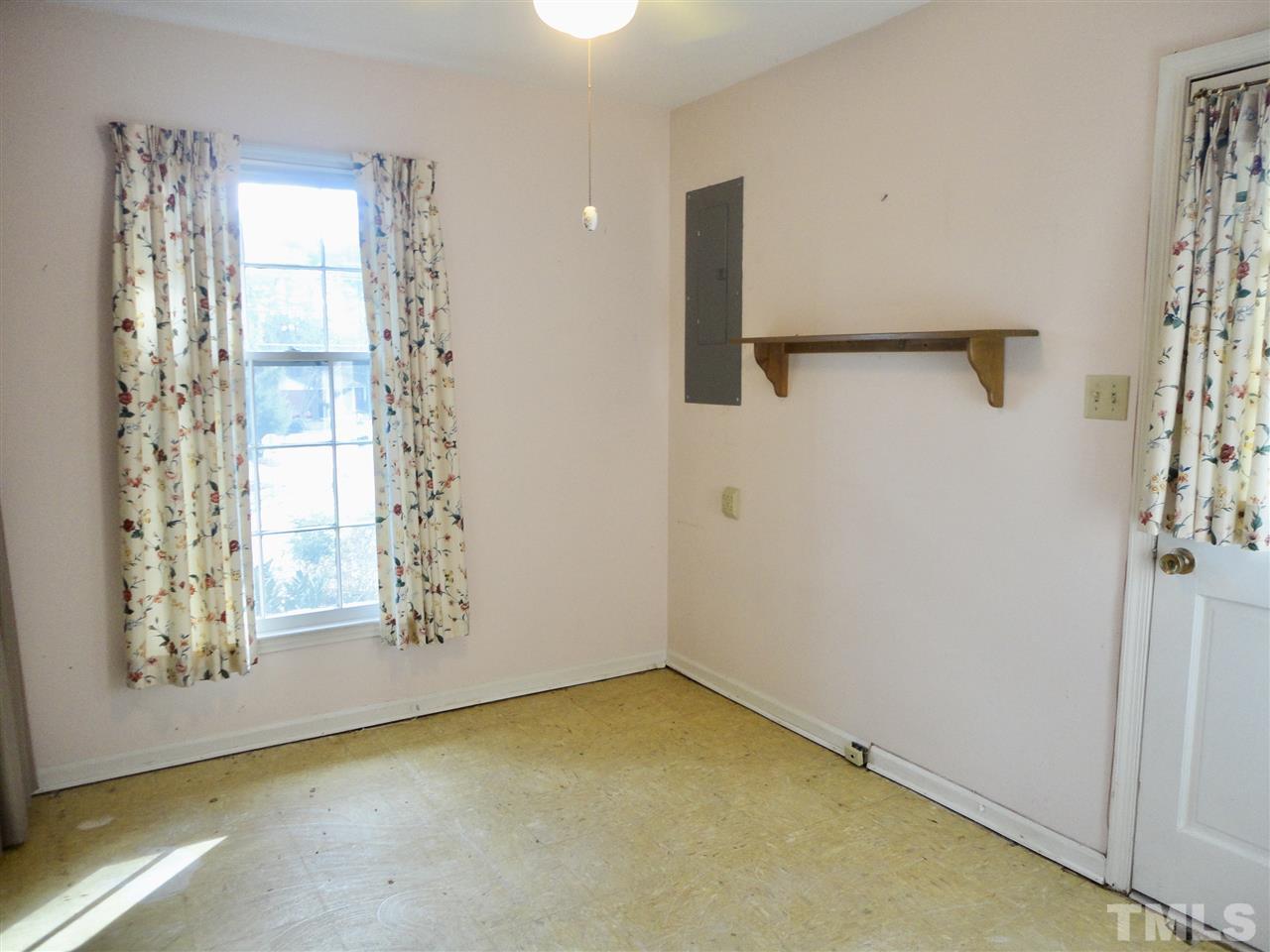 2907 New Hope Church Road Raleigh, NC 27604 - Photo 20 of 25 a view of an empty room with a window
