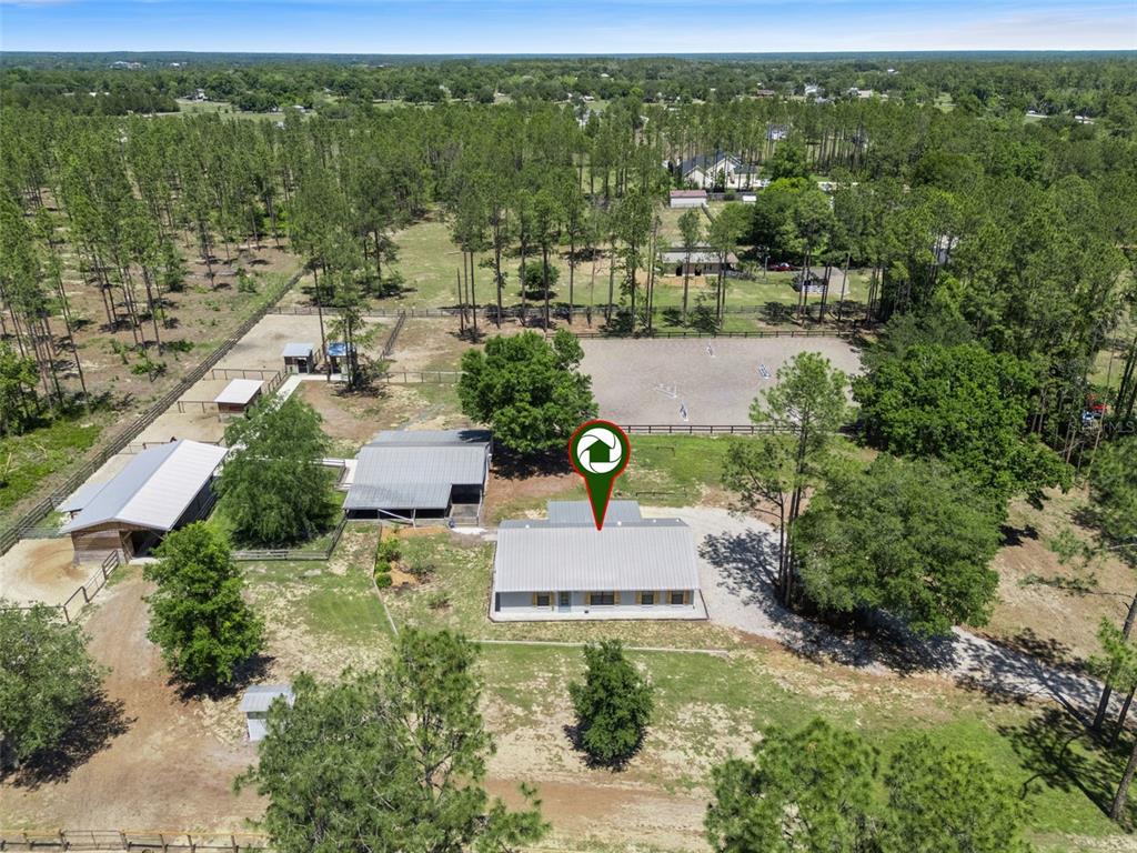 20701 County Road 44A Eustis, FL 32736 - Photo 3 of 73 an aerial view of a house with a yard