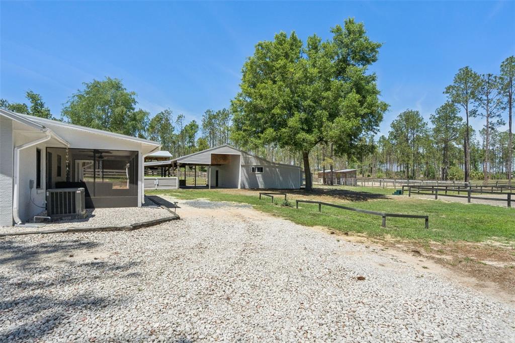 20701 County Road 44A Eustis, FL 32736 - Photo 41 of 73 a view of a house with a yard and tree s