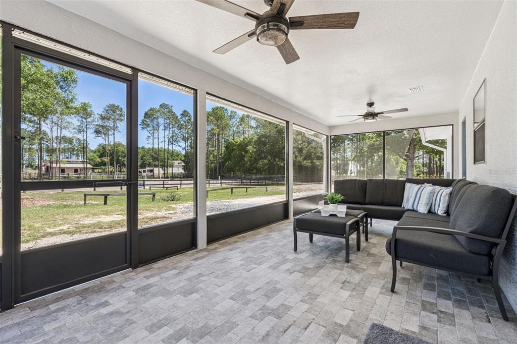 20701 County Road 44A Eustis, FL 32736 - Photo 48 of 73 a living room with furniture and a large window