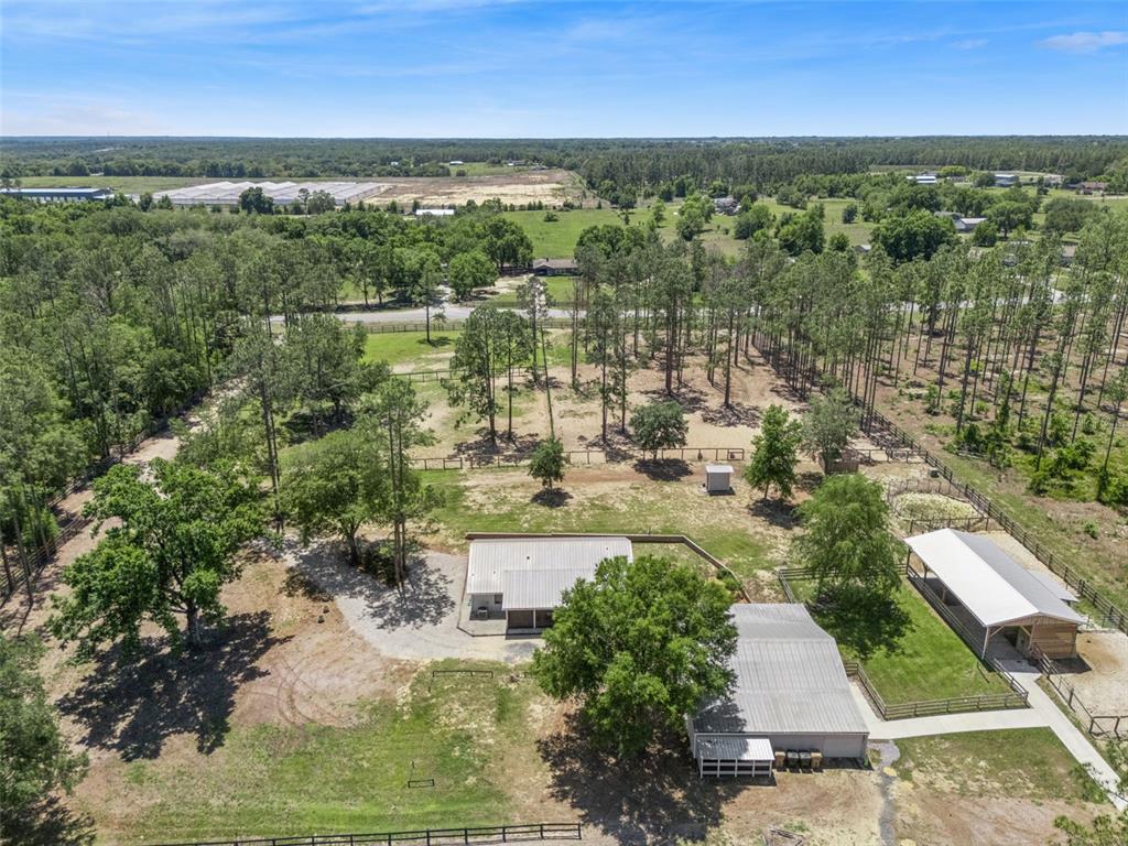 20701 County Road 44A Eustis, FL 32736 - Photo 5 of 73 an aerial view of a city with lots of residential buildings