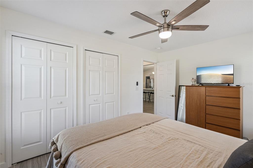 20701 County Road 44A Eustis, FL 32736 - Photo 66 of 73 a bedroom with a bed and a dresser