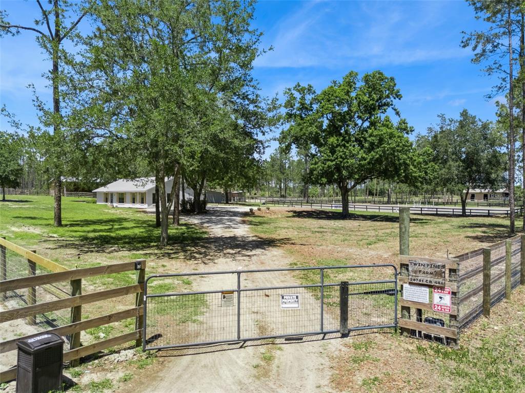 20701 County Road 44A Eustis, FL 32736 - Photo 71 of 73 a view of a yard with an outdoor seating