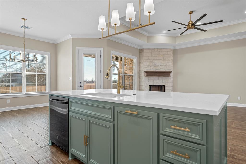 109 Water View Lane Robinson, TX 76706 - Photo 12 of 35 a kitchen with a sink stove and refrigerator